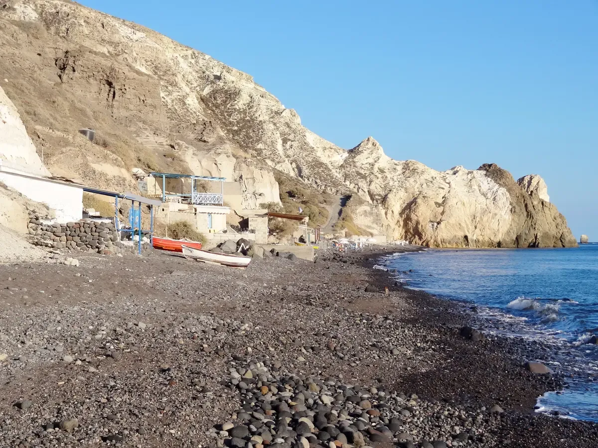 Mesa Pigadia beach with clear water on the Santorini coast, a swim stop on a Santorini catamaran cruise