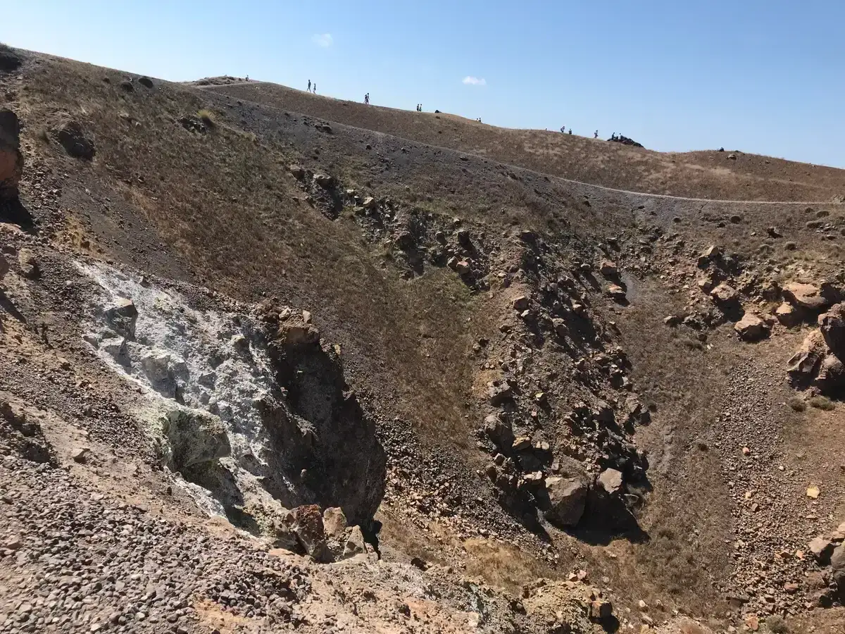 Volcanic crater on Nea Kameni in the Santorini caldera, visited on a catamaran cruise