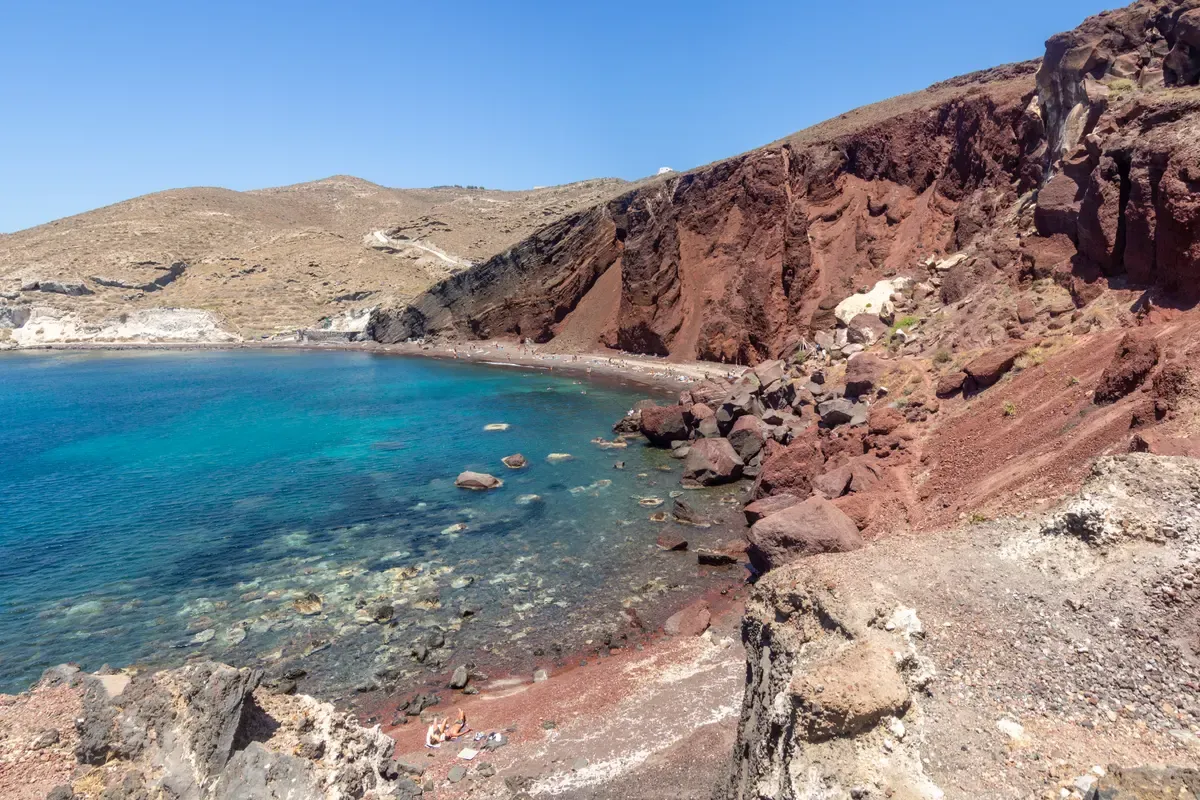 Red Beach on Santorini with its red volcanic cliffs as seen on a Santorini catamaran cruise